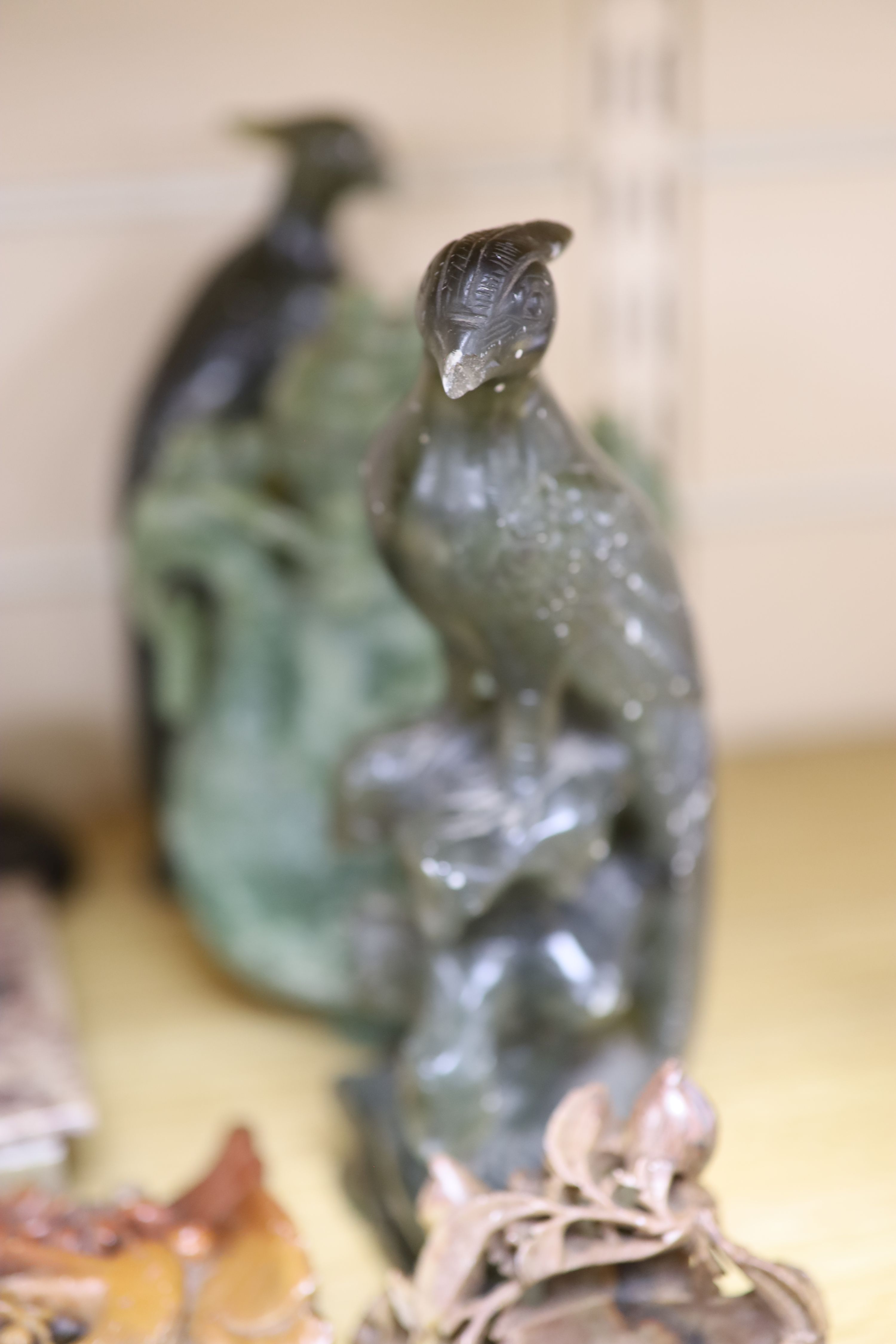 A collection of hardstone and soapstone carvings